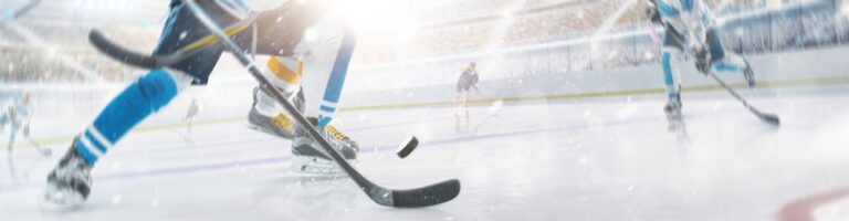 Focused on the hockey puck. Hockey action